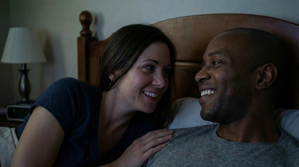 happy  couple in bed